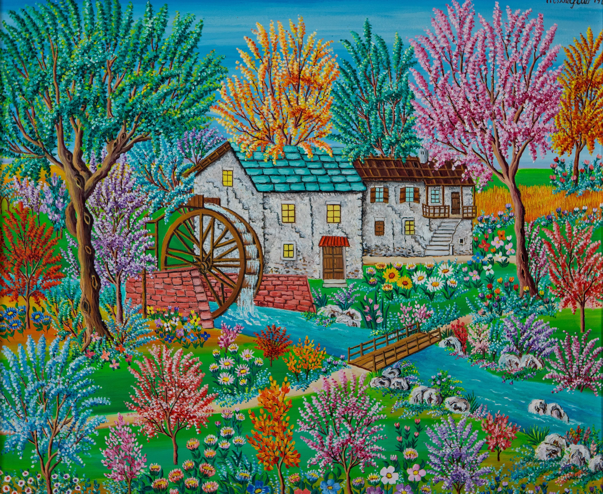 Mulino con la ruota ad acqua